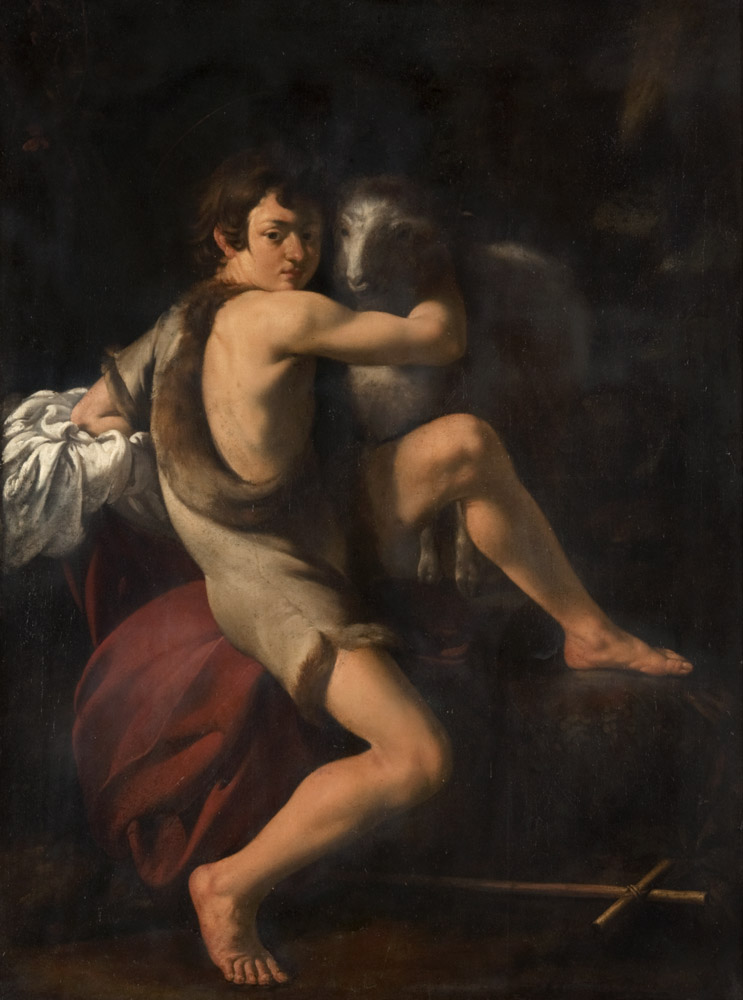 Joven con un cordero